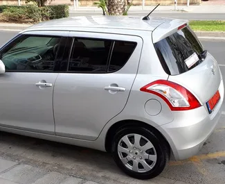 在 在塞浦路斯 租赁 Suzuki Swift 2016 汽车，特点包括 ✓ 使用 Petrol 燃料和 82 马力 ➤ 起价 18 EUR 每天。