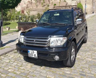 租赁 Mitsubishi Pajero Io 的正面视图，在第比利斯, 格鲁吉亚 ✓ 汽车编号 #1314。✓ Automatic 变速箱 ✓ 14 评论。