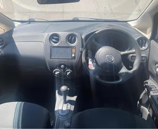 在 在塞浦路斯 租赁 Nissan Note 2014 汽车，特点包括 ✓ 使用 Petrol 燃料和 100 马力 ➤ 起价 20 EUR 每天。