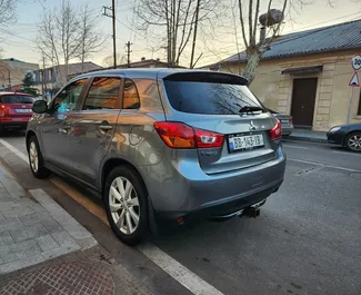 在 在格鲁吉亚 租赁 Mitsubishi Outlander Sport 2015 汽车，特点包括 ✓ 使用 Petrol 燃料和 160 马力 ➤ 起价 95 GEL 每天。