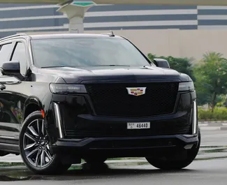 在 阿联酋 租赁 Cadillac Escalade 2023 汽车，特点包括 ✓ 使用 Petrol 燃料和 600 马力 ➤ 起价 950 AED 每天。