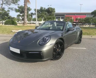 租赁 Porsche 911 Carrera Cabrio 的正面视图，在伊维萨机场, 西班牙 ✓ 汽车编号 #10455。✓ Automatic 变速箱 ✓ 0 评论。