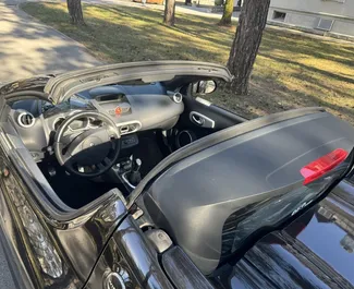 租赁 Renault Wind Cabrio 的正面视图，在布德瓦, 黑山共和国 ✓ 汽车编号 #14490。✓ Manual 变速箱 ✓ 1 评论。