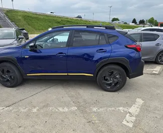 在 在格鲁吉亚 租赁 Subaru Crosstrek 2024 汽车，特点包括 ✓ 使用 Petrol 燃料和 100 马力 ➤ 起价 145 GEL 每天。